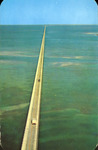 A Bird's-eye view from a helicopter of the Seven Mile Bridge on the Overseas Highway to Key West, Florida by Hampton Dunn