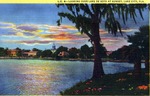 Looking over Lake DeSoto at sunset, Lake City, Florida by Hampton Dunn