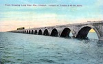 Train crossing Long Key, Florida, viaduct. Length of trestle 2 68-100 miles by Hampton Dunn