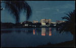 Downtown St. Petersburg Reflected in Mirror Lake, Florida by Hampton Dunn