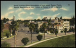 Davis Boulevard, Main Thoroughfare of Davis Island, Tampa, Florida Spanish Apartments on Right, Palace of Florence in left Background by Hampton Dunn
