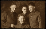 Portrait of Four Men. by Hampton Dunn