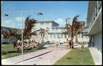 The Tropical Patio and Swimming Pool at The Glades Hotel. by Hampton Dunn