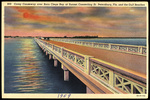 Corey Causeway over Boca Ciega Bay at Sunset, Connecting St. Petersburg, Florida and the Gulf Beaches. by Hampton Dunn