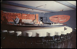 Scene of the Hibiscus Lounge. by Hampton Dunn