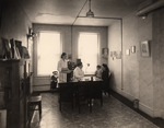 Dr. Julio L. Gavilla with family in his office