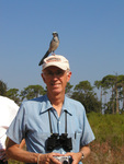 Florida Ornithological Society (FOS) member poses with a Florida Scrub-jay on his head, Leesburg, Florida