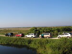 Florida Ornithological Society (FOS) members unload a caravan of vehicles, Leesburg, Florida
