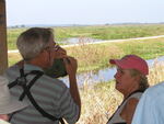 Murray Gardler and Soo Whiting tend to a wildlife camera, Leesburg, Florida