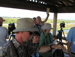 Florida Ornithological Society (FOS) members discuss around a camera, Leesburg, Florida