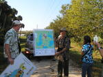 Two Florida Ornithological Society (FOS) members present maps of marsh area in Leesburg during a birding trip