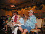 Seated Florida Ornithological Society (FOS) members listen to a speaker during a Board of Directors meeting in Mount Dora by Florida Ornithological Society