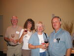 Douglas Clark, Joyce King, and two others pose with their drinks, Mount Dora, Florida