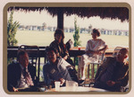 Bill Robertson and 4 other Florida Ornithological Society (FOS) members lounge outside during a spring meeting in Naples by Florida Ornithological Society