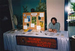 Reed Bowman works a Florida Ornithological Society (FOS) exhibit at the 1994 National Audubon Society Convention in Fort Myers