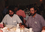 Eugene Stoccardo and Dave Goodwin share a meal during the Florida Ornithological Society (FOS) 1994 spring meeting in West Palm Beach by Florida Ornithological Society