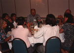 Glen Woolfenden sits at a full table at the Florida Ornithological Society (FOS) 1994 spring meeting in West Palm Beach