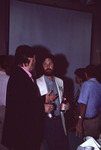 Reed Bowman converses with another Florida Ornithological Society (FOS) member at the 1994 spring meeting in West Palm Beach