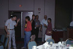 John and Linda Douglas mingle with other Florida Ornithological Society (FOS) members during the 1994 spring meeting in West Palm Beach