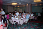 Florida Ornithological Society (FOS) members enjoy a meal in a large ballroom during the 1995 fall meeting in Cocoa Beach
