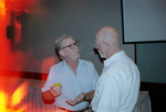 Two Florida Ornithological Society (FOS) members share a conversation during the 1995 fall meeting in Cocoa Beach