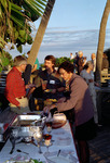 Florida Ornithological Society (FOS) members chat and serve food during the 1995 fall meeting in Cocoa Beach