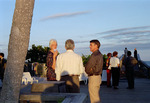 Three Florida Ornithological Society (FOS) members chat by the water during the 1995 fall meeting in Cocoa Beach