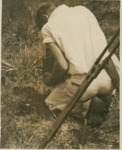 Man Taking Photograph in Field by Samuel A. Grimes