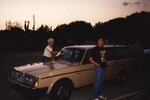 Two Florida Ornithological Society (FOS) members clean a brown Volvo during a meeting in Jacksonville, Florida