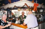 Ed and Marie Slaney grab a drink at the bar during a Florida Ornithological Society meeting in Jacksonville, Florida