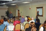 Florida Ornithological Society members look on during a speech at a Holiday Inn in Jacksonville, Florida