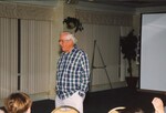 A Florida Ornithological Society member gives a speech with his hands in his pockets during a meeting in Jacksonville, Florida