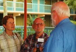 Linda and Buck Cooper speak with John Douglas at a Florida Ornithological Society meeting in Tampa, Florida