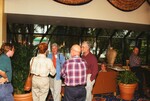 Florida Ornithological Society members mingle during a meeting in Tampa, Florida