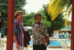 Linda Douglas stands poolside with another guest at a Florida Ornithological Society meeting in Tampa, Florida