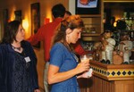 Guests grab drinks from the bar at a Florida Ornithological Society meeting in Tampa, Florida