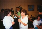 Jan Woolfenden chats with a fellow guest at a Florida Ornithological Society meeting in Tampa, Florida
