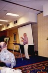 John Fitzpatrick gestures mid-speech during a spring Florida Ornithological Society meeting in Tampa, Florida