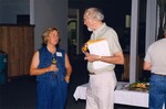 Two guests discuss during a Florida Ornithological Society reception at the Florida Museum of Natural History