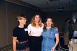 Pam Bowen smiles with two others for a picture during a Florida Ornithological Society meeting in Gainesville, Florida