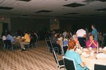 A banquet hall full of Florida Ornithological Society members chats during a Florida Ornithological Society meeting in Gainesville, Florida by Florida Ornithological Society
