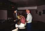 Fred and Charlotte Lohrer sit at the bar during a Florida Ornithological Society meeting in the Bahamas