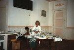 Two Florida Ornithological Society members sell shirts at the 1996 meeting in the Bahamas