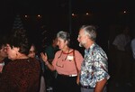 Lyn Atherton and another Florida Ornithological Society member chat with fellow attendees of the 1996 fall meeting in the Bahamas