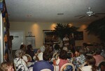 Two Florida Ornithological Society presenters exhibit a photograph of a waterbird during the 1996 meeting in the Bahamas