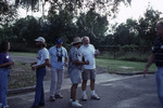John Douglas chats with a drink in hand during a picnic at Archbold Biological Station