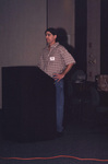 Todd Angshar stands at a podium during a Florida Ornithological Society meeting in Tallahassee, Florida