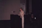 Dr. Fran Jones speaks behind a podium at a Florida Ornithological Society meeting in Tallahassee, Florida by Florida Ornithological Society
