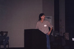 Todd Angshar looks away from the audience while speaking at a Florida Ornithological Society meeting in Tallahassee, Florida