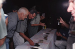 Don Ware and Bob Duncan take part in a bird skins quiz at a Florida Ornithological Society meeting in Tallahassee, Florida by Florida Ornithological Society